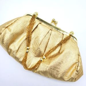 Gold clutch with beaded strap